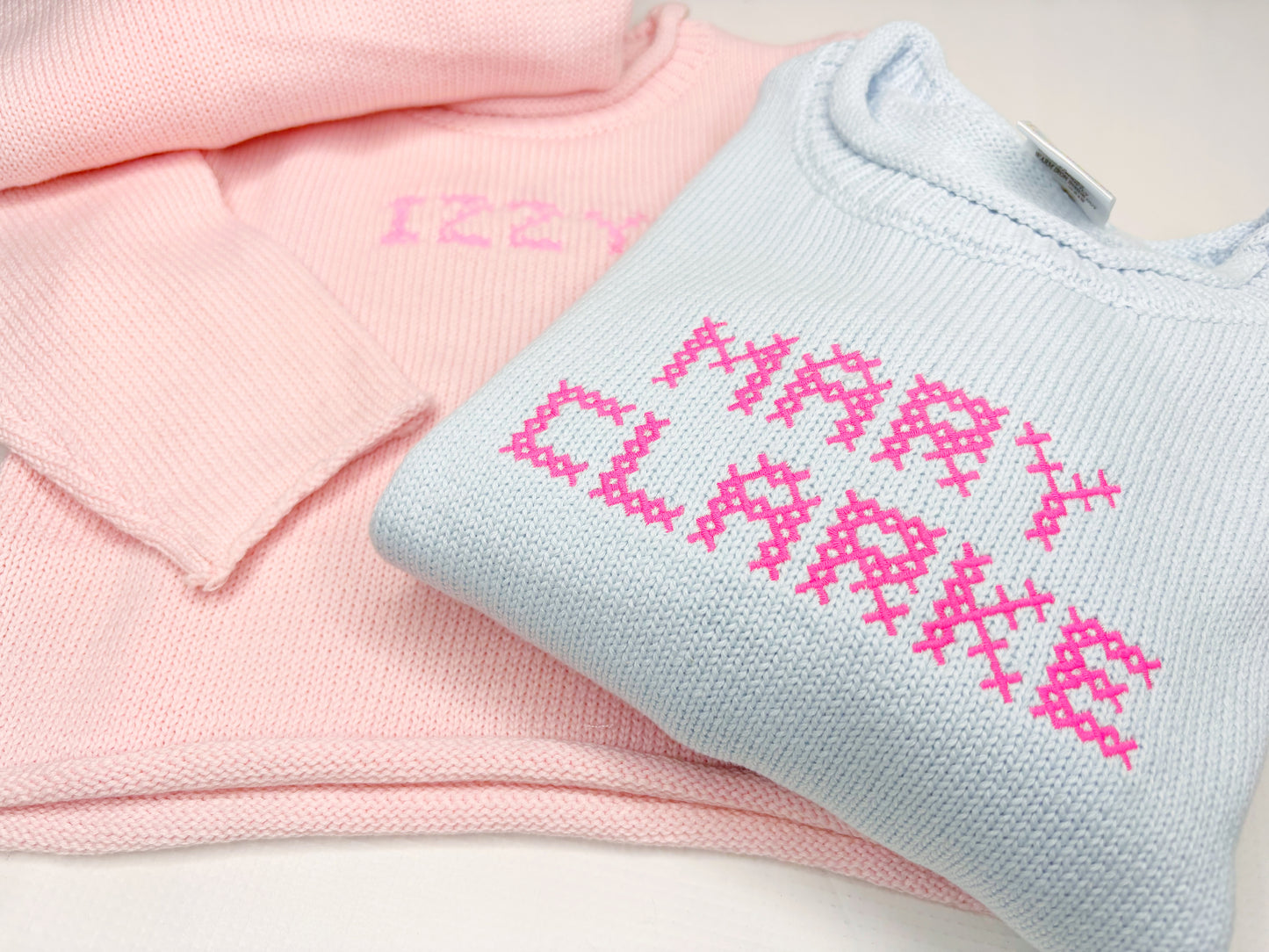 Unisex Roll Neck Sweater With Cross Stitch Font