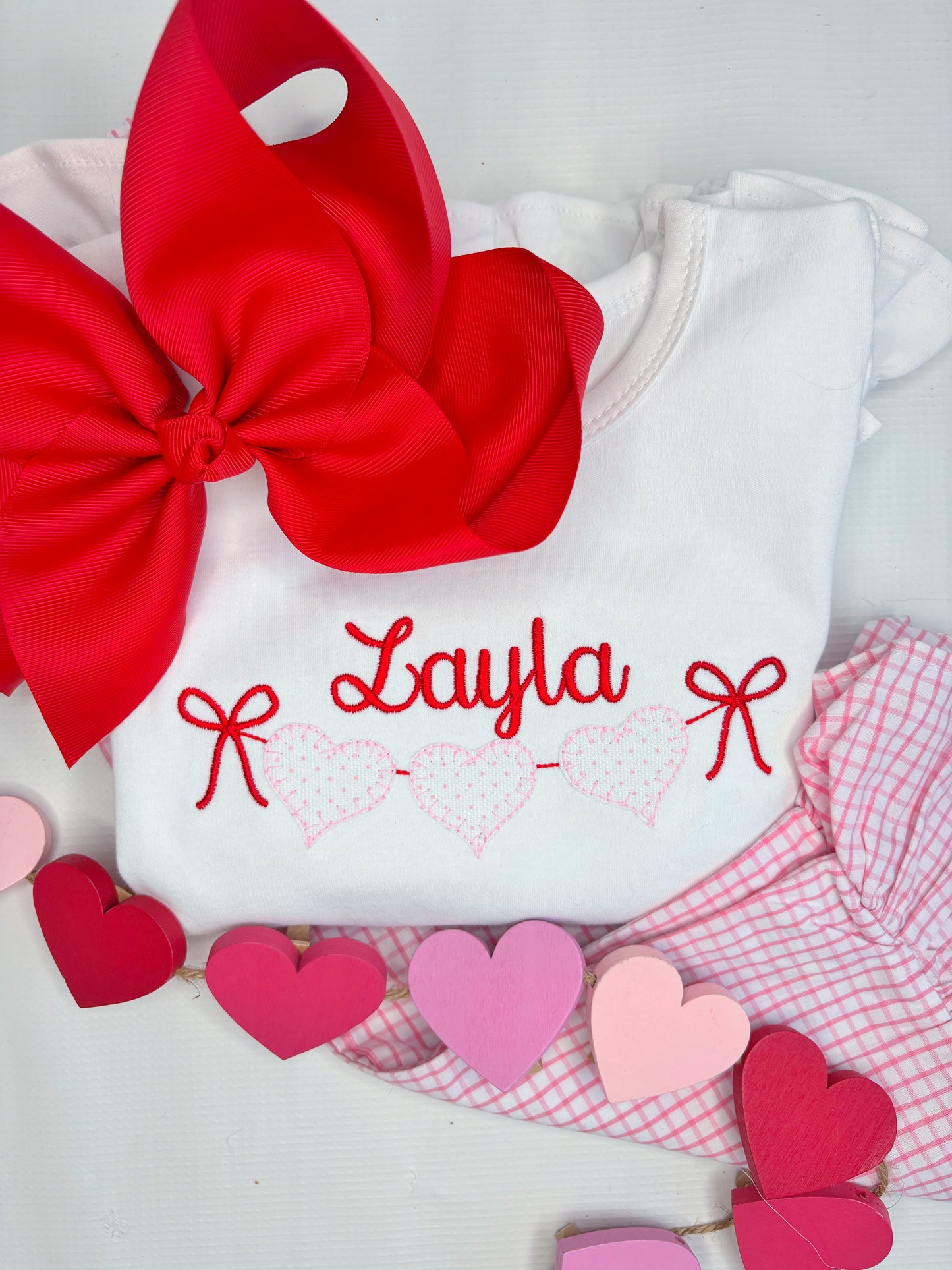 Handing Hearts Applique Design