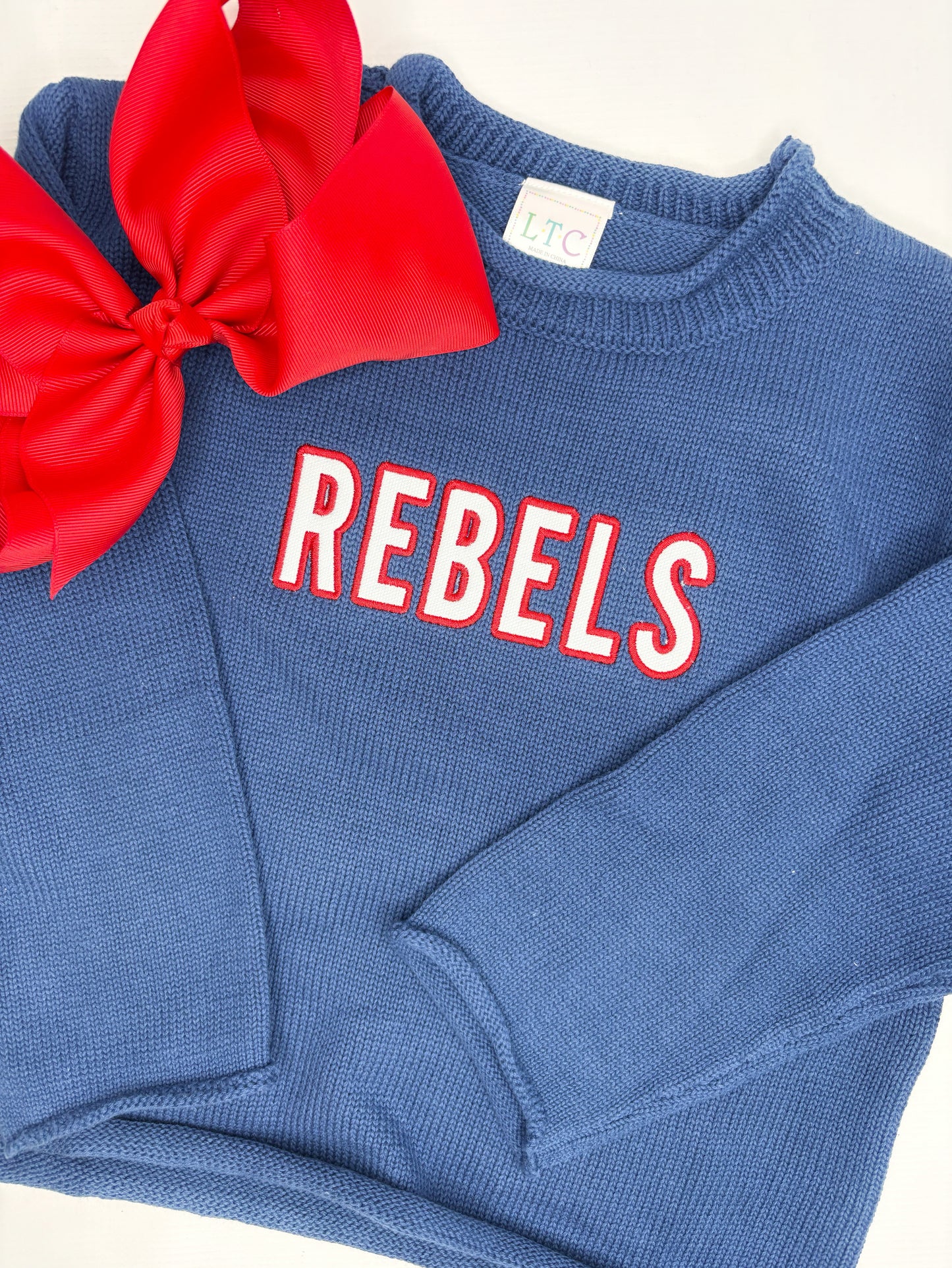 Unisex Roll Neck Sweater With Cross Stitch Font