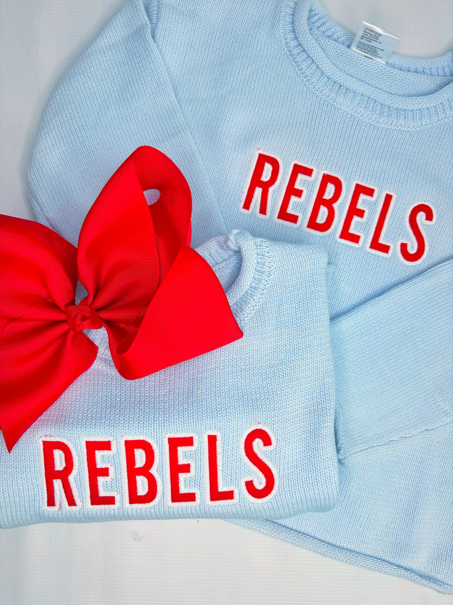 Unisex Roll Neck Sweater With Cross Stitch Font
